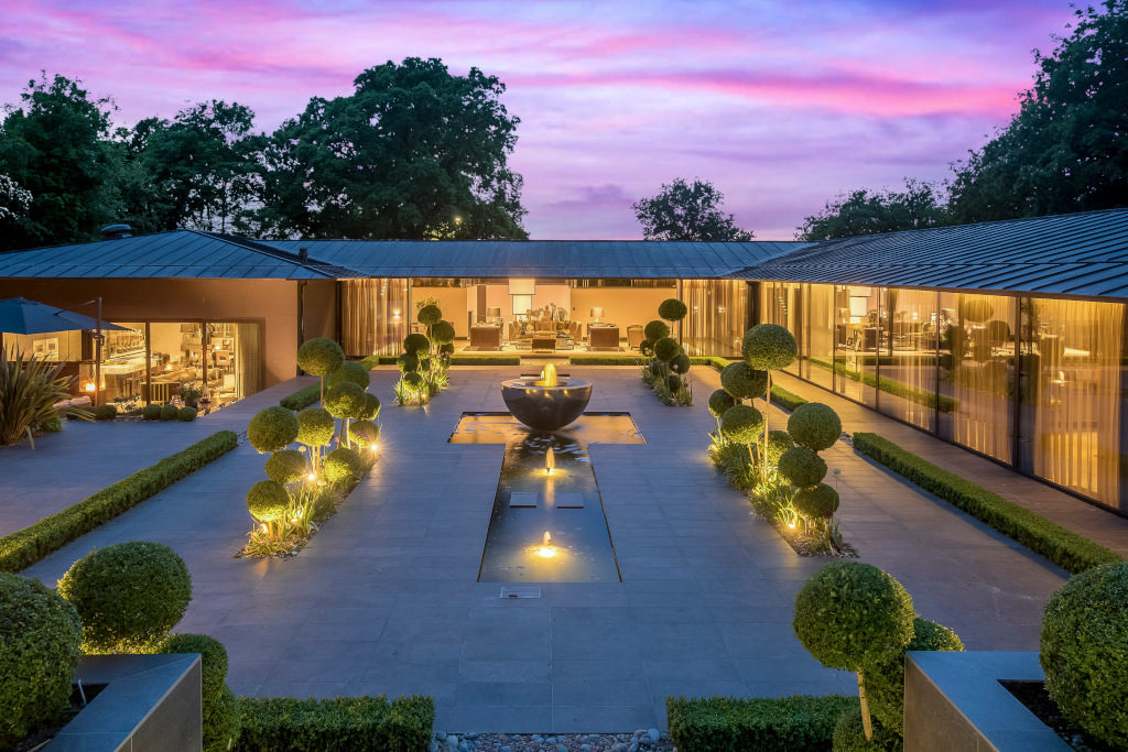 evening shot of modern contemporary luxury home in Warwickshire
