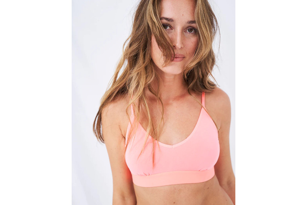 Model in pink bralette