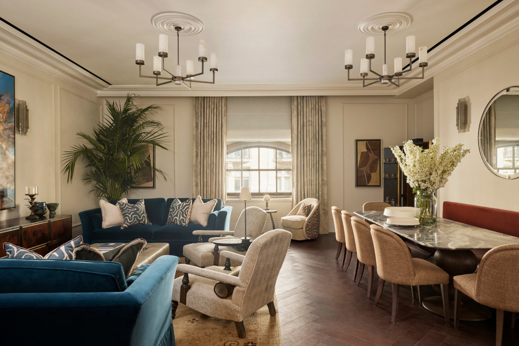 The OWO Residences interior of elegant reception room and dining room.