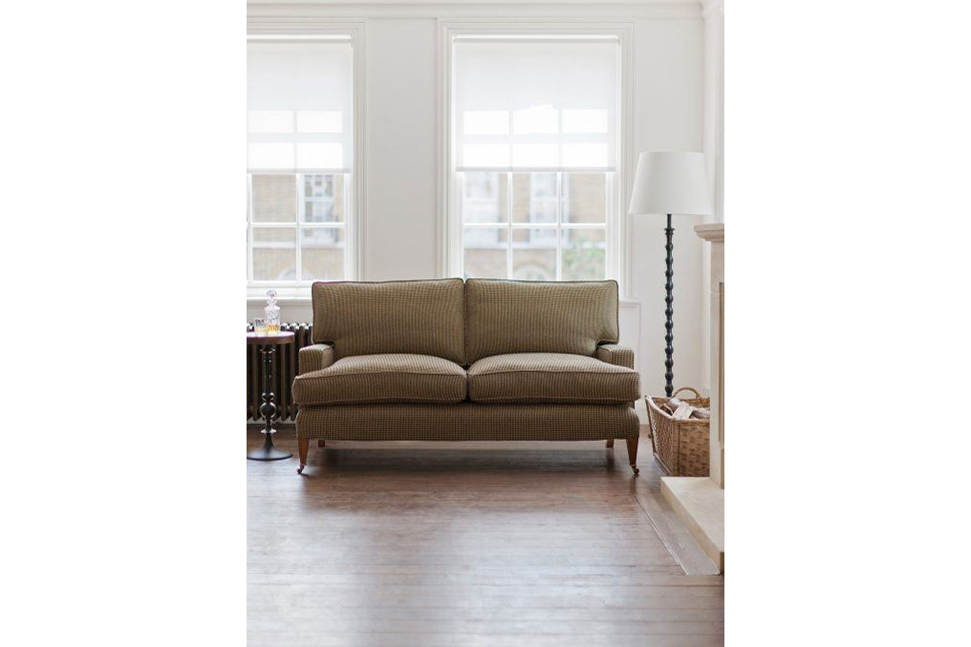 a Beaumont & Fletcher sofa in a light and bright townhouse inteior