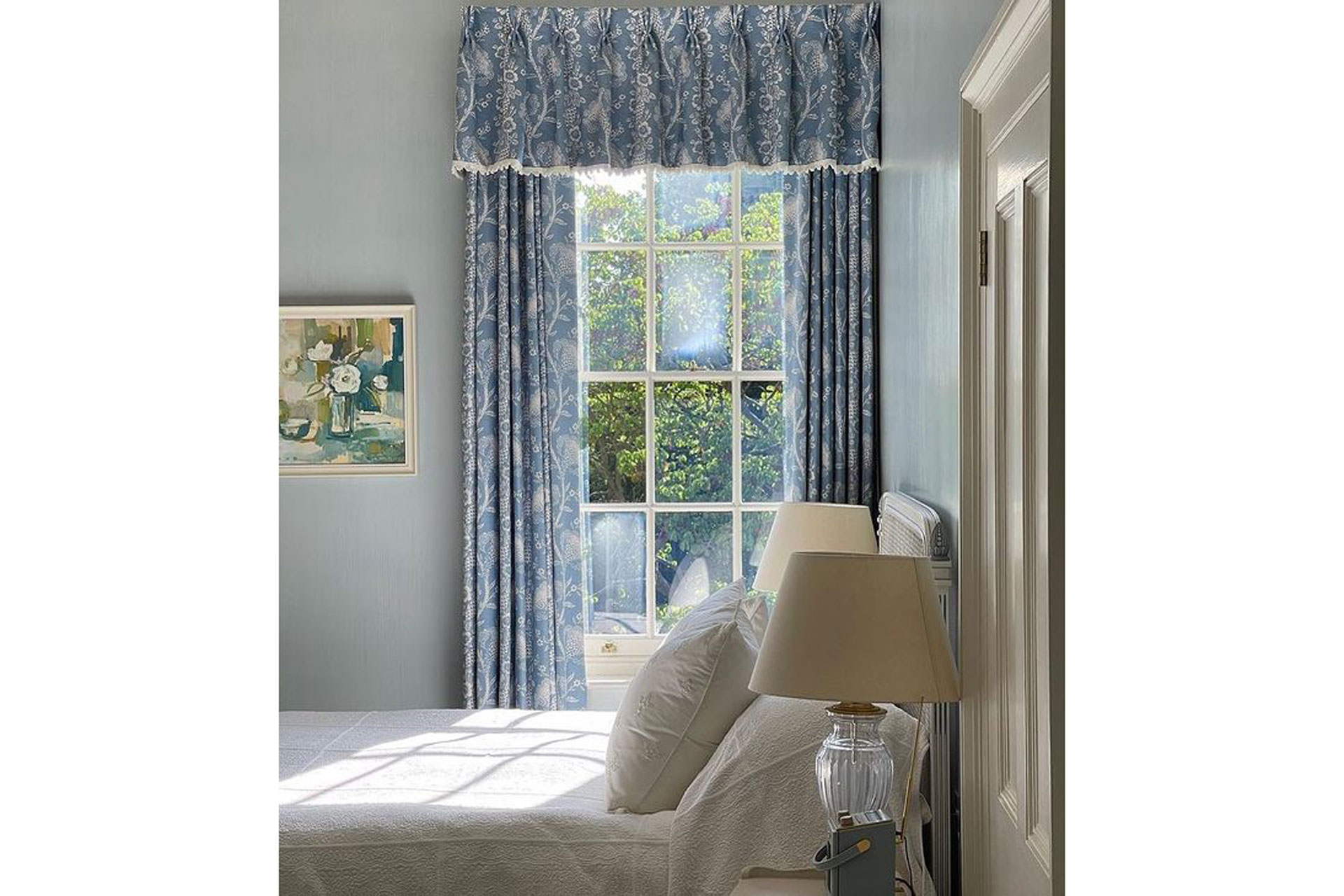 Custom coloured mid-blue Leopard Lily drapes and wonderful morning light from @emmabenyondesigns Image: Bennison Fabrics, bennisonfabrics.com, Instagram: @bennisonny