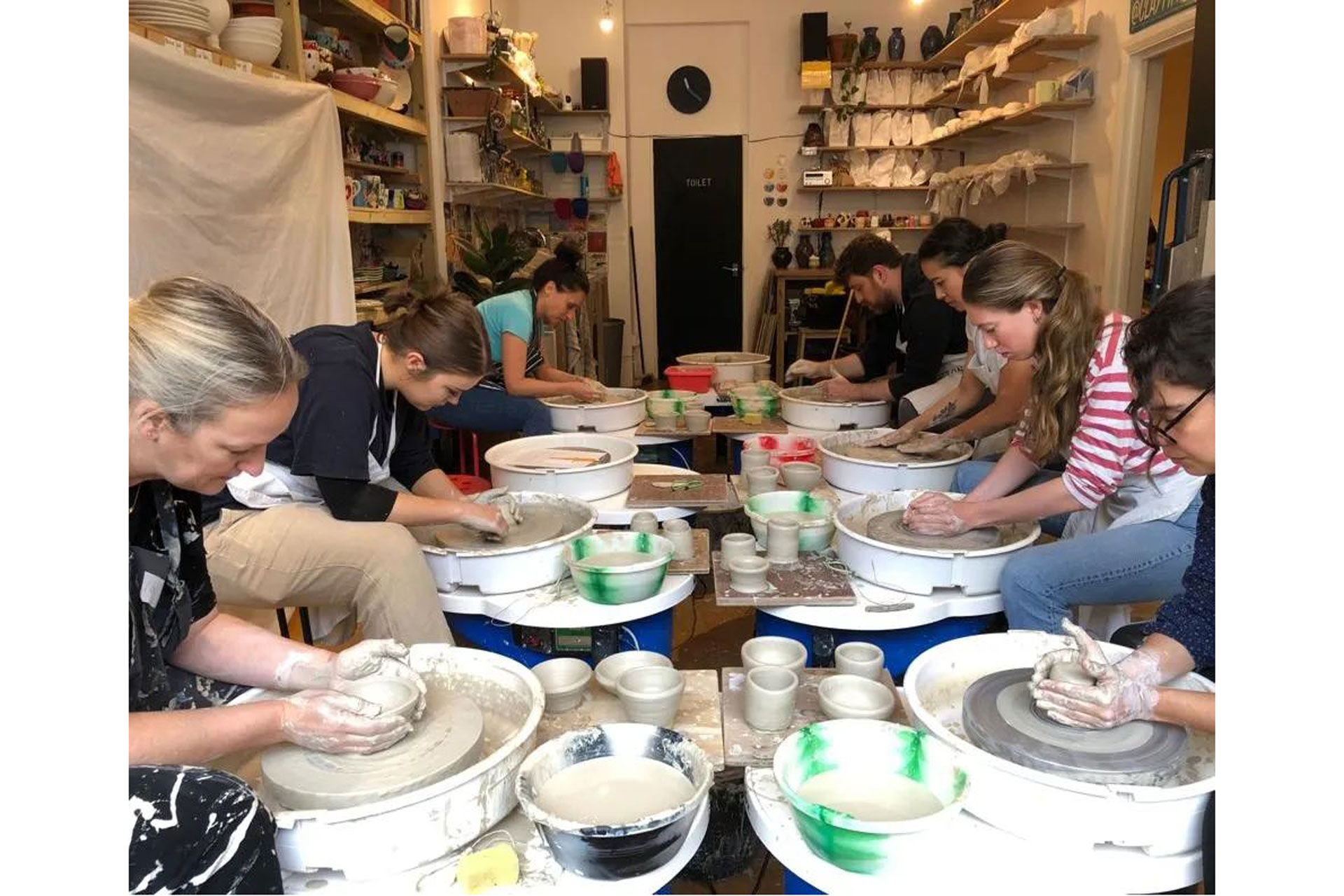 a group of people doing pottery at Clay Time in London