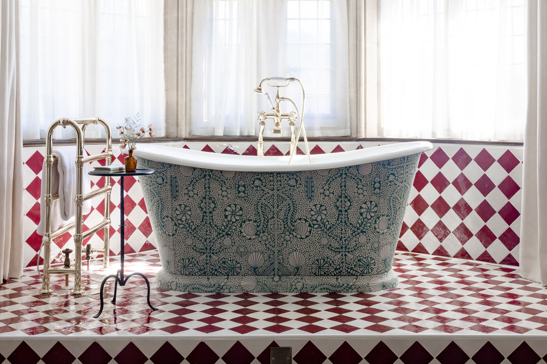 a red and white tile checked bathroom at the Georgian Manor, Kin House, that's just been renovated by Barlow & Barlow