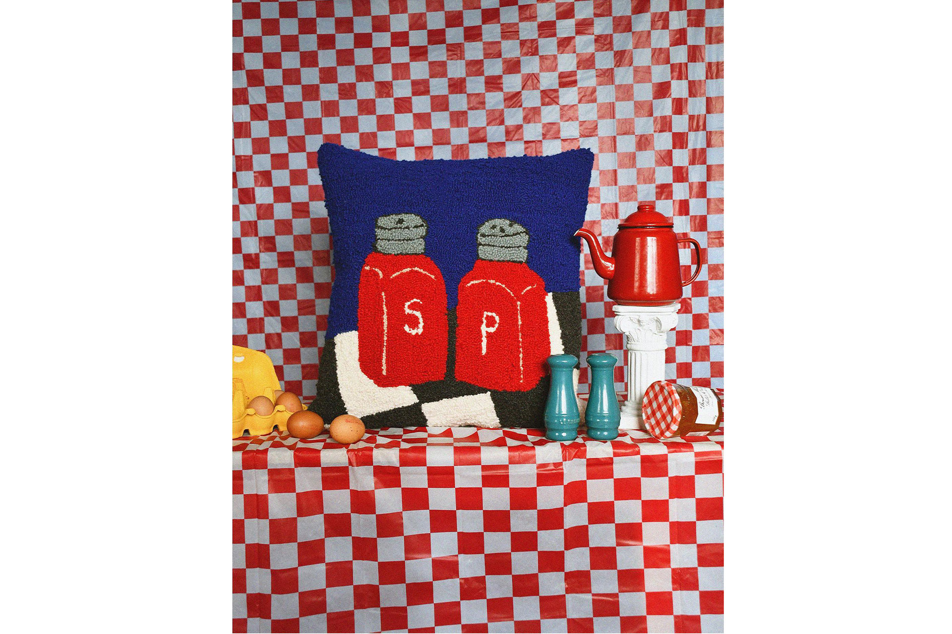 chequered print with a salt and pepper pillow sold by Selfridges