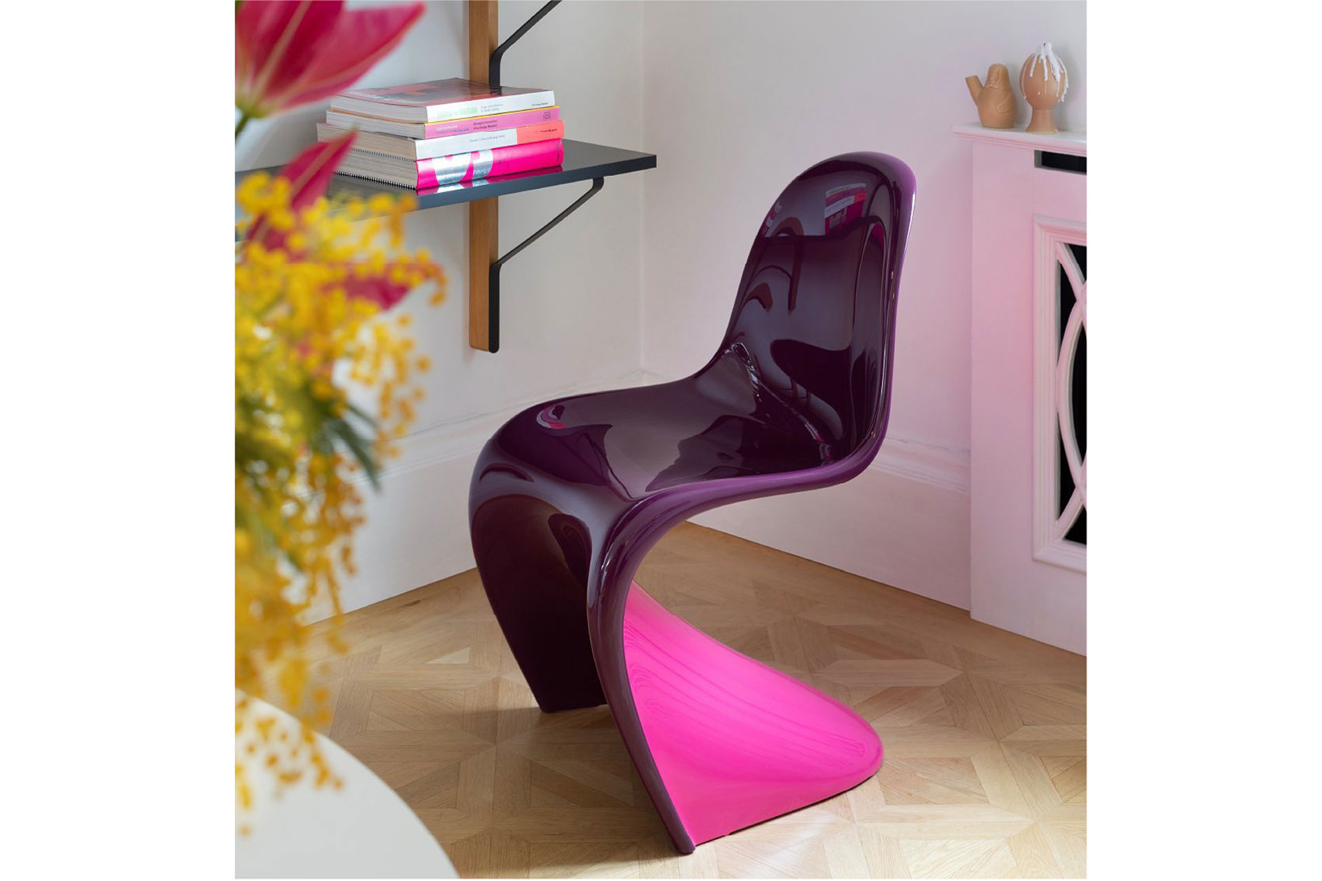 a purple 70s curved chair in front of a desk, sold by The Conran Store