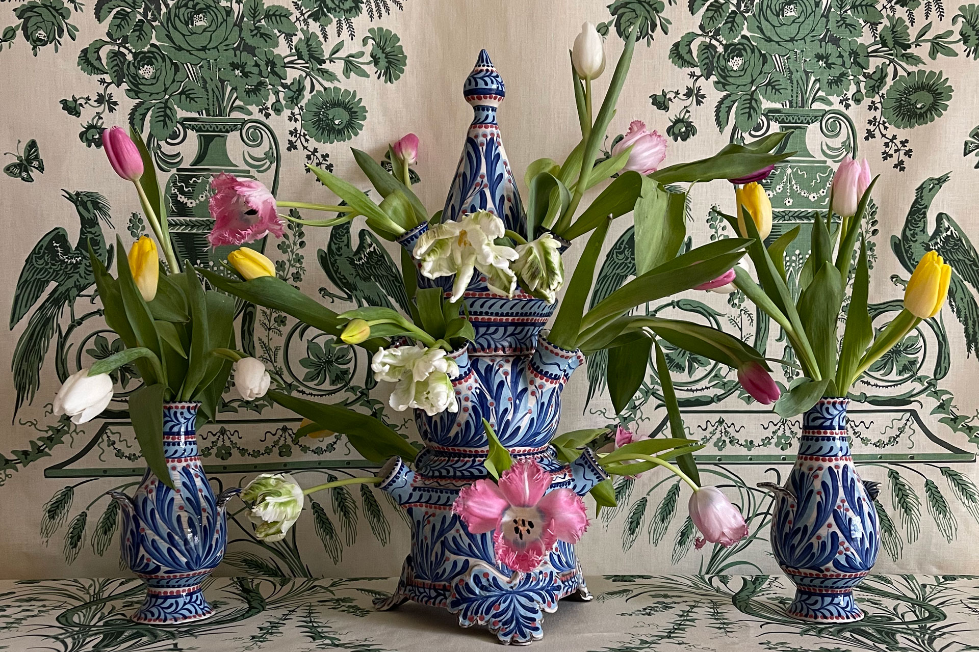 a group of three delft tulipieres staged by JET by Whiteworks and created by Katrin Moye