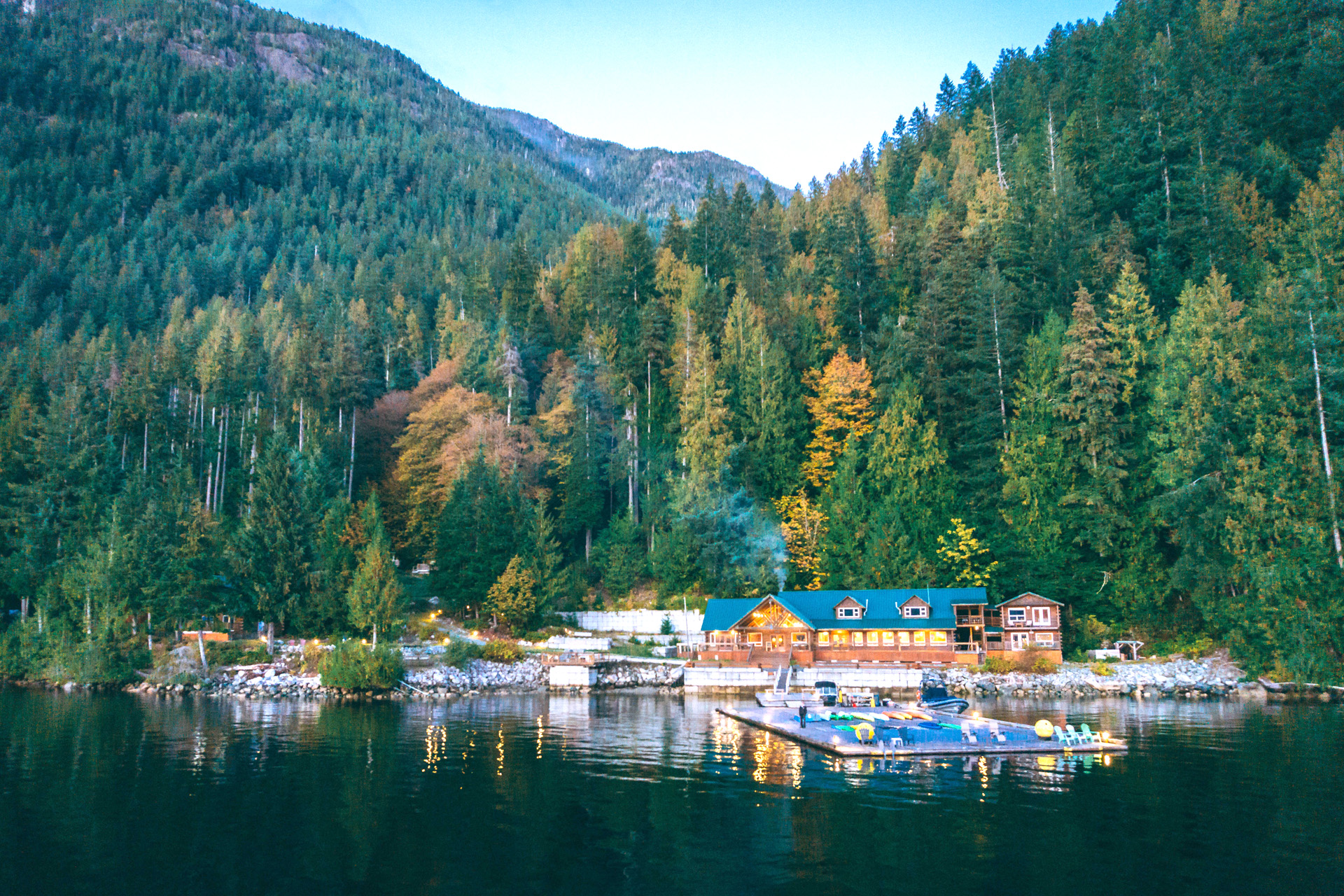 Klahoose Wilderness Resort in front of vast autumn forest