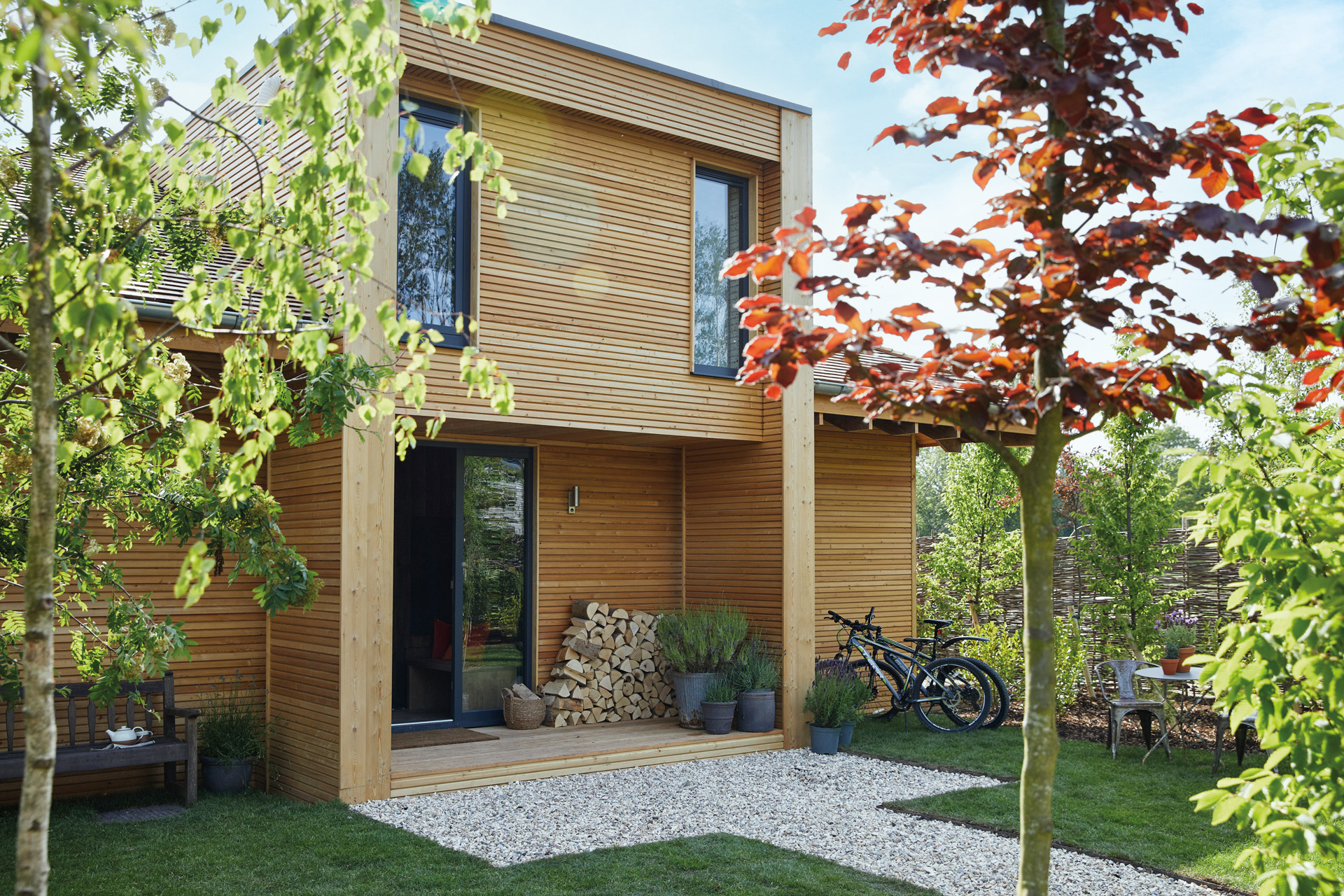 A modern wood cabin with trees