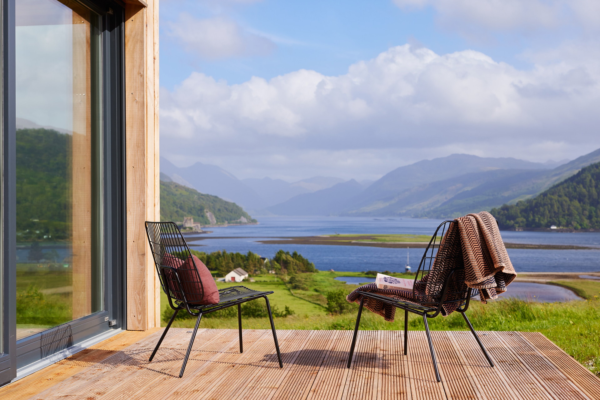 Two chairs overlooking a panoramic view at 57 Nord