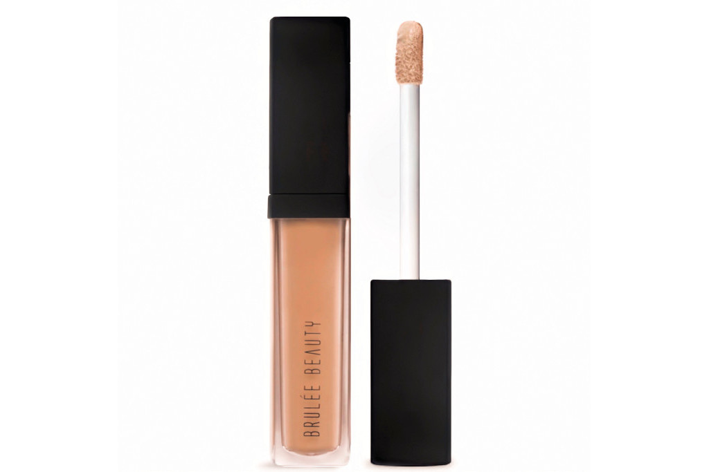 Clear tube with black lid containing concealer