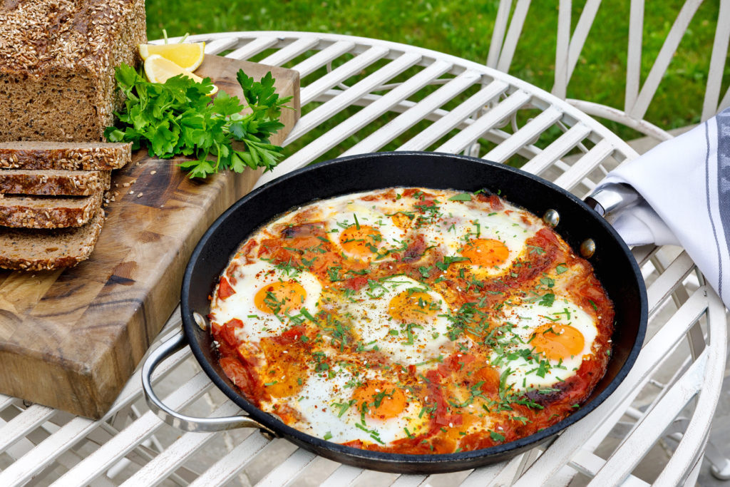A pan of eggs on an outdoor table; With M, Feasting and Relaxation Retreat
