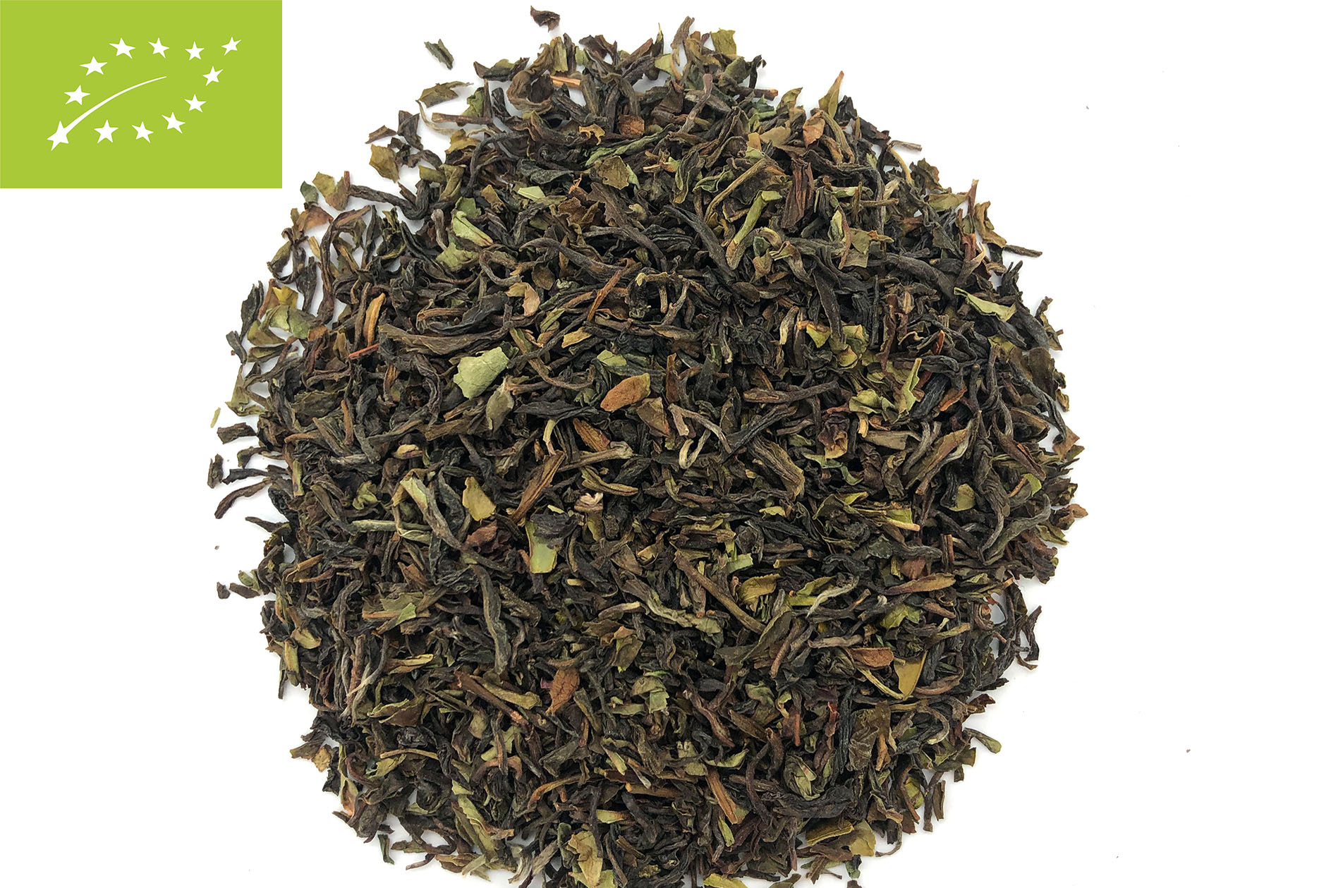 Pukka tea leaves Darjeeling First Flush with Organic logo