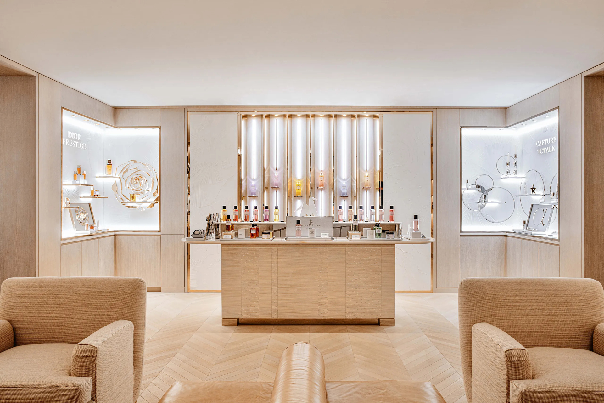 A luxurious waiting room with Dior products on display