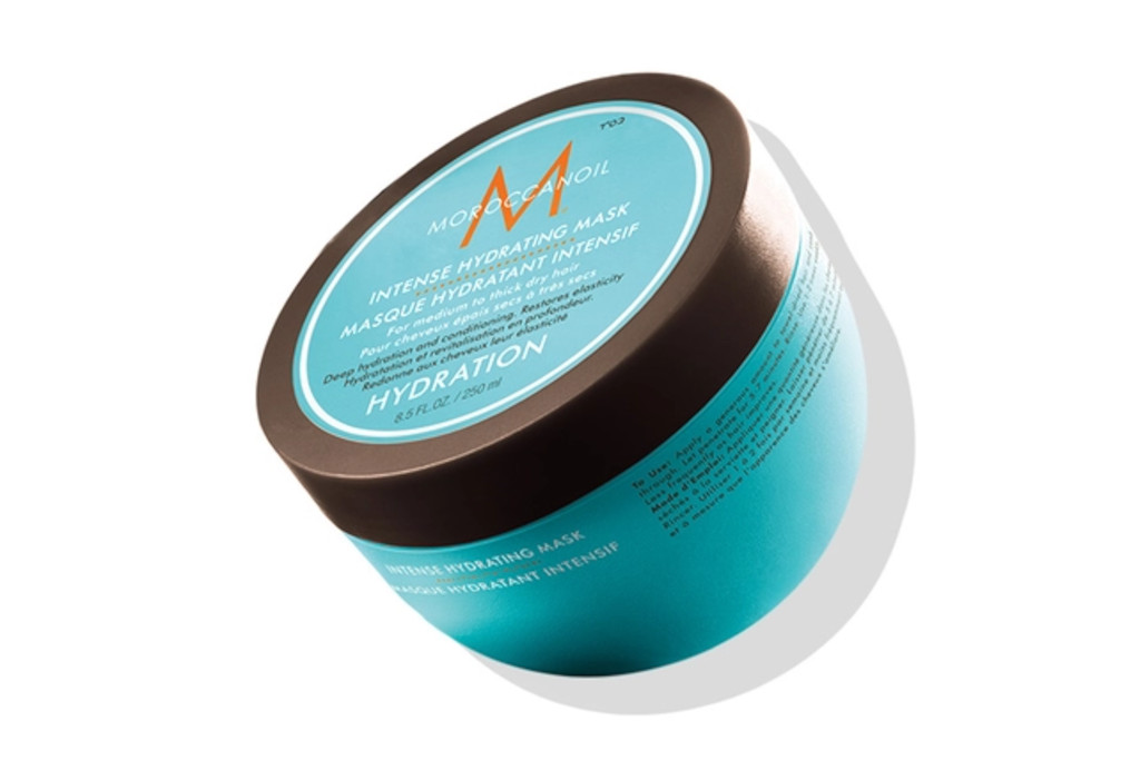 Blue tub withe the Moroccanoil logo on the top, with text on the top and sides in black and white text