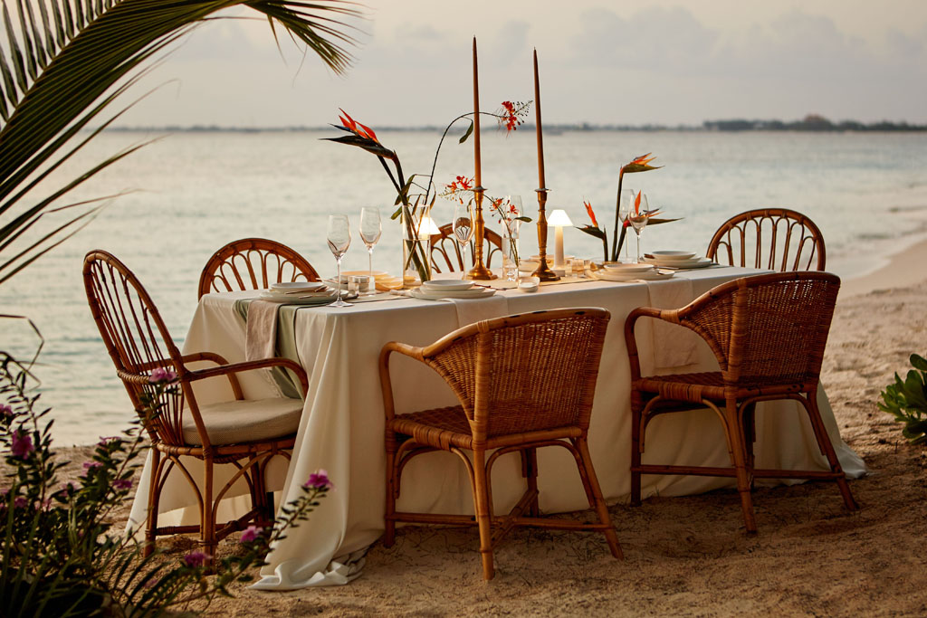 alfresco table on the beach at Palm Heights hotel Cayman Islands 