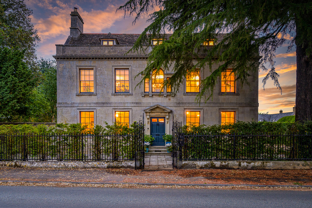 double fronted house in evening with glowy windows in peterborough