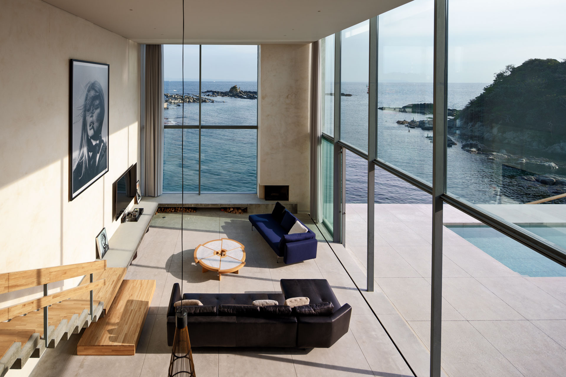 Peninsula house, a japanese interior that looks out from floor to ceiling glass windows onto Mount Fuji