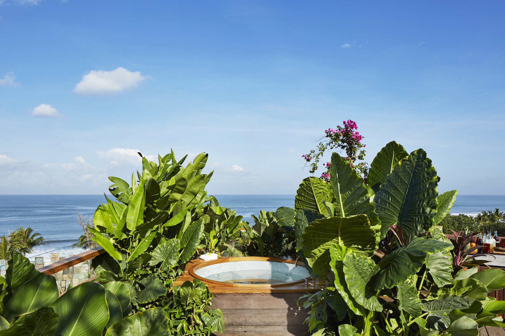 rooftop jacuzzi against a blue sky