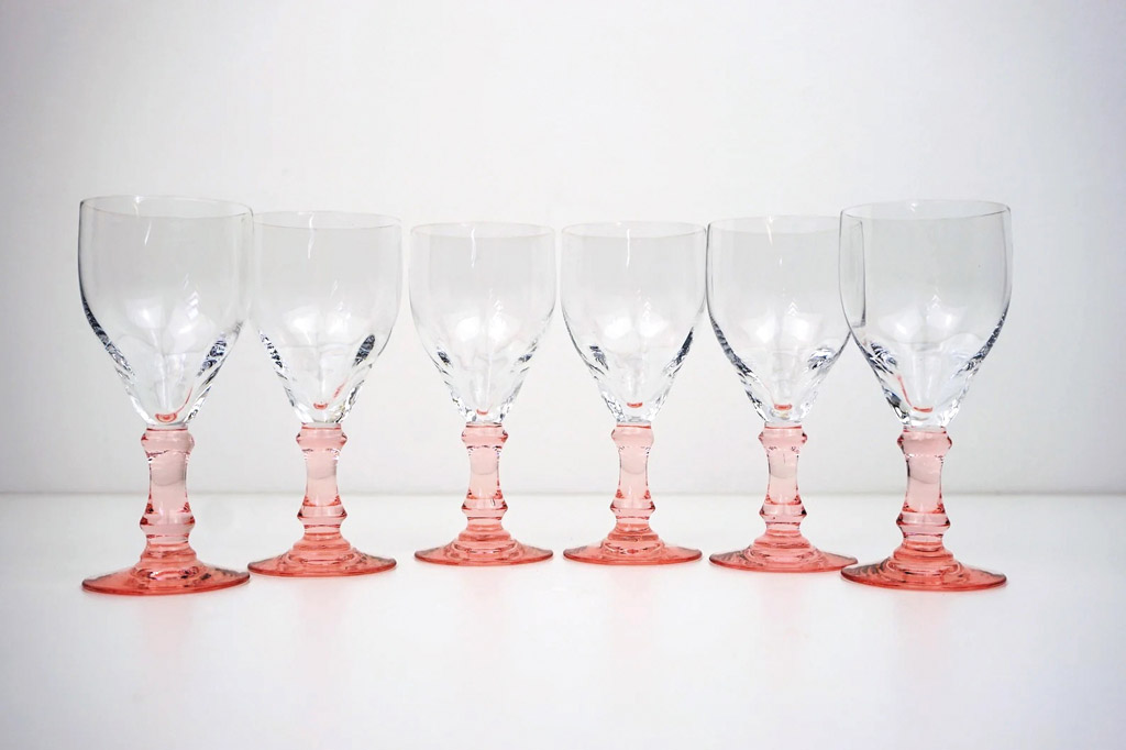 Set of six crystal wine glasses with pink handles