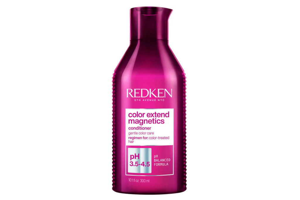 Shiny pink bottle of conditioner