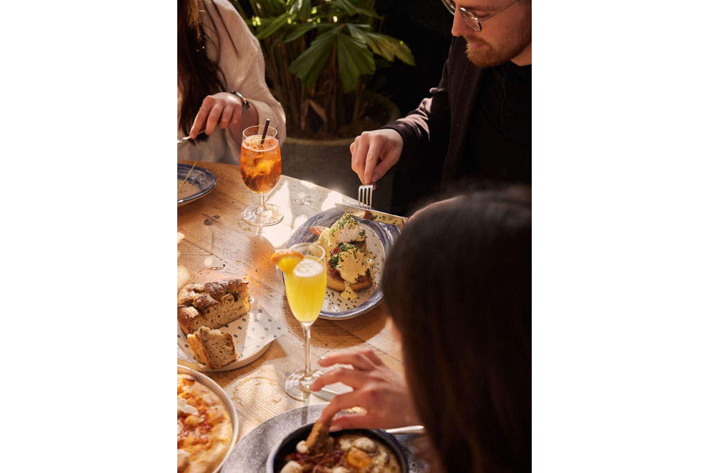 people eating brunch at coppa club bath townhouse