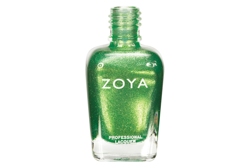 Bottle of sparkly green nail polish with no cap