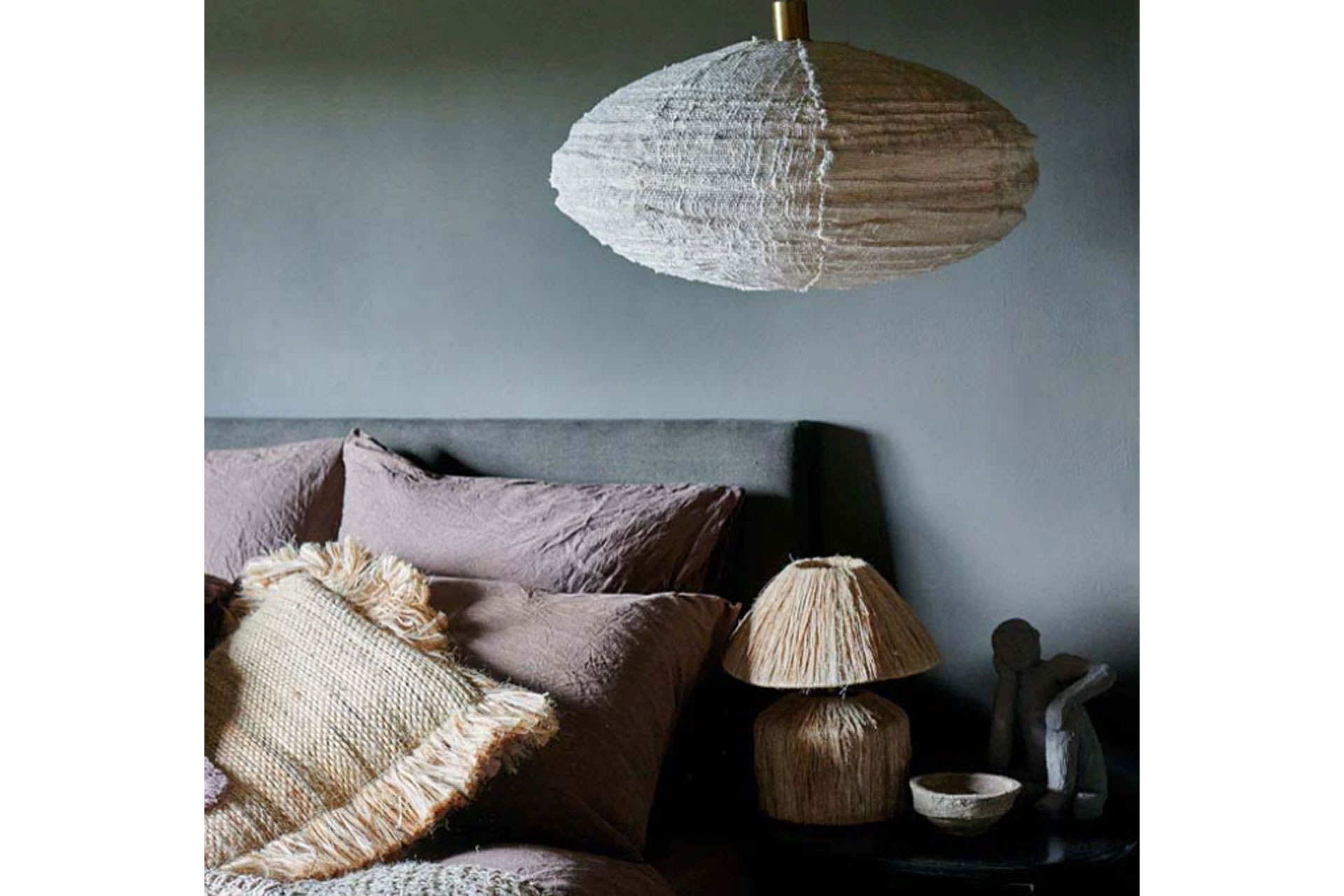 a cocoon linen pendant lamp by Abigail Ahern