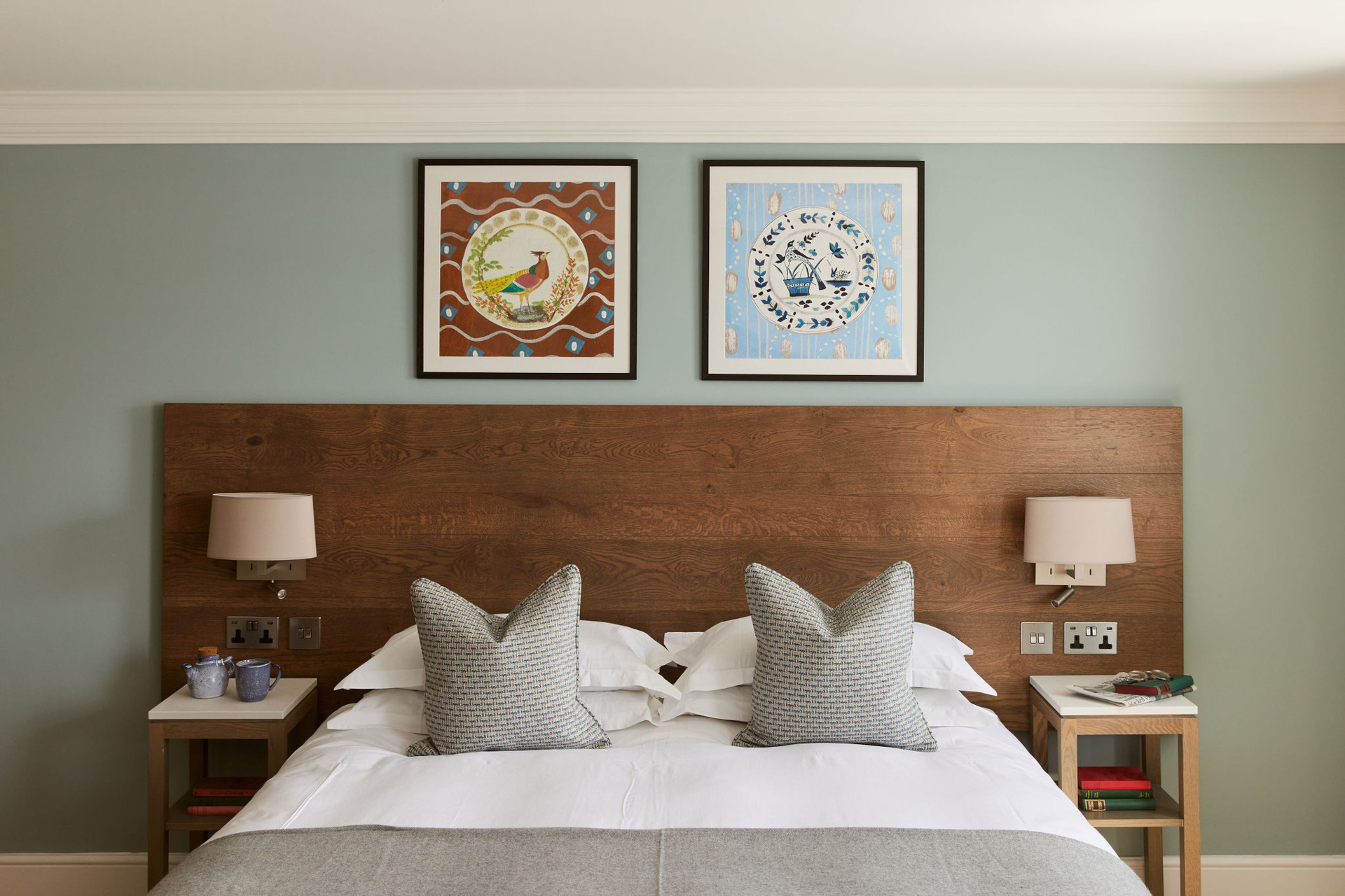 The Georgian coppa club hotel bedroom shot of bed with wooden and blue walls