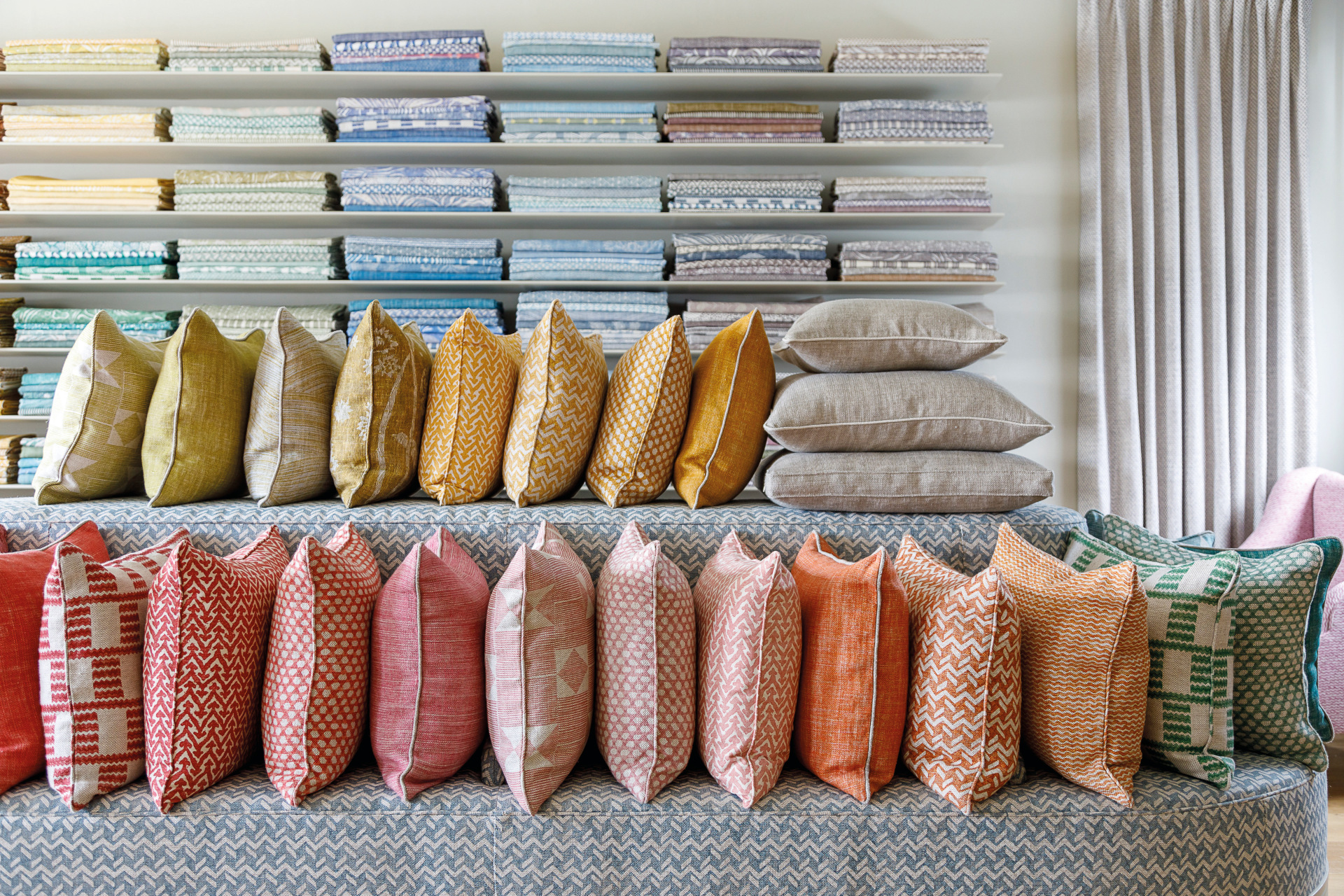 selection of different colour cushions in fermoie design