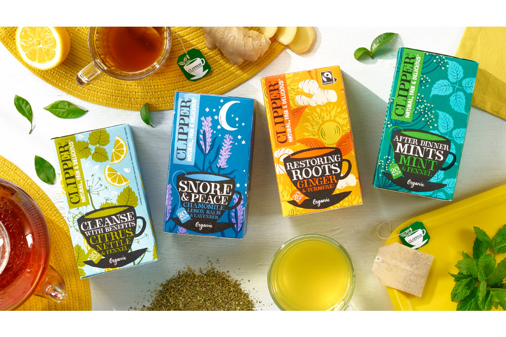 selection of clipper tea boxes lying on table