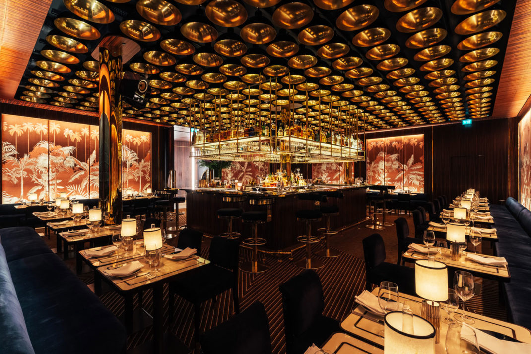 interior view of Isabel Mayfair restaurant in London with lights in the ceiling