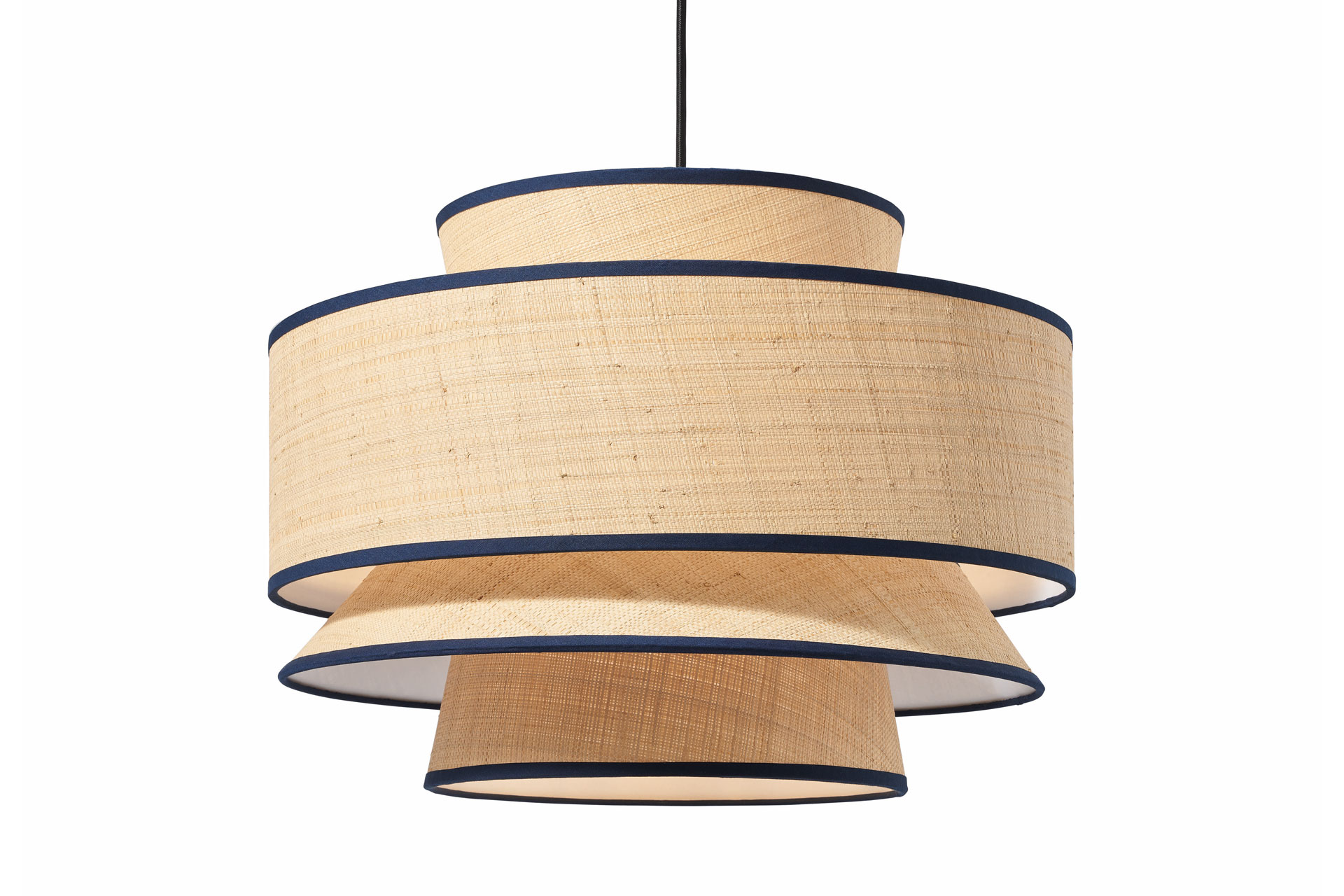 The Haroon Lamp that's a ceiling light with rattan and rimmed with a navy blue border, sold by Made