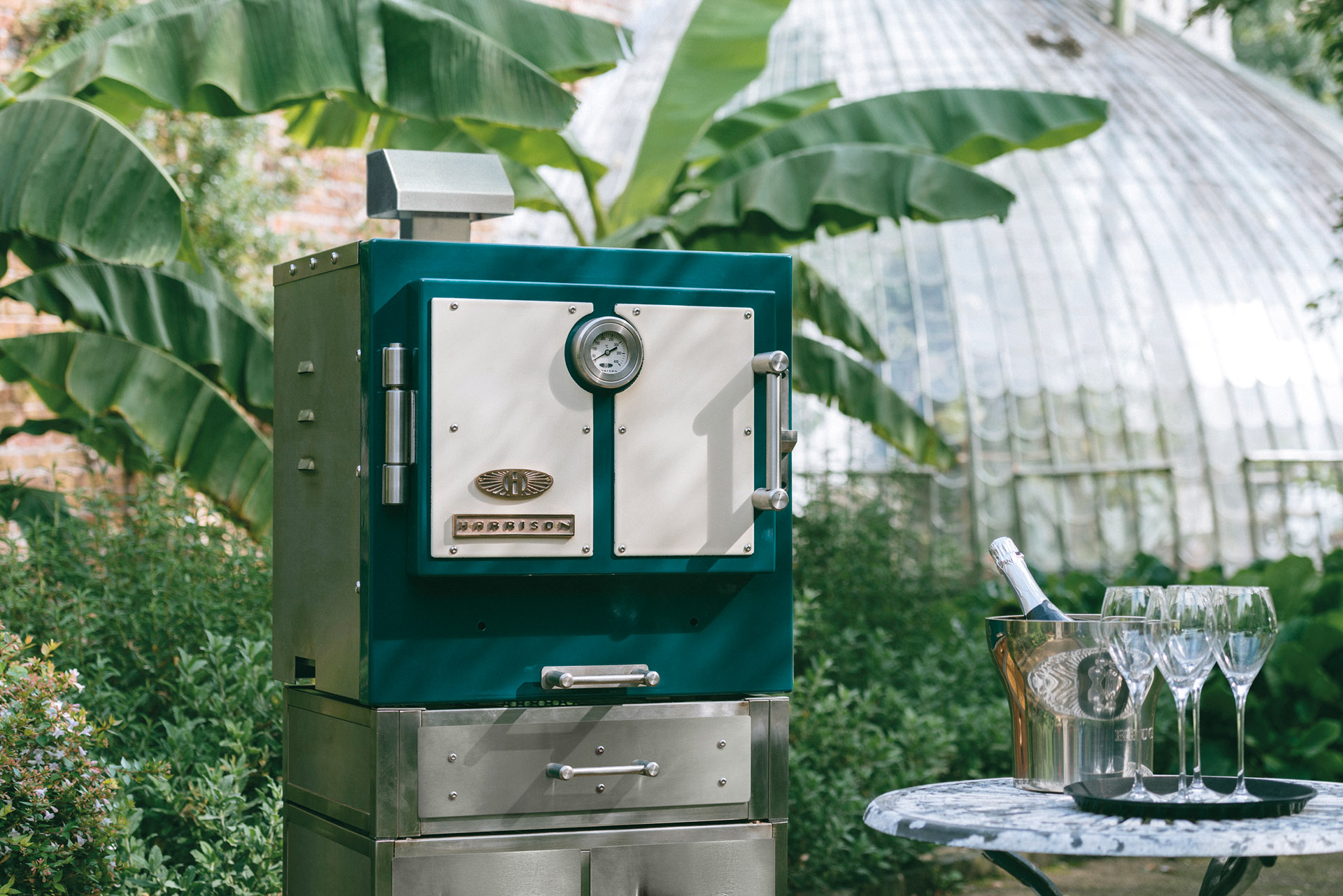 Harrison Ovens green oven surrounded by leaves