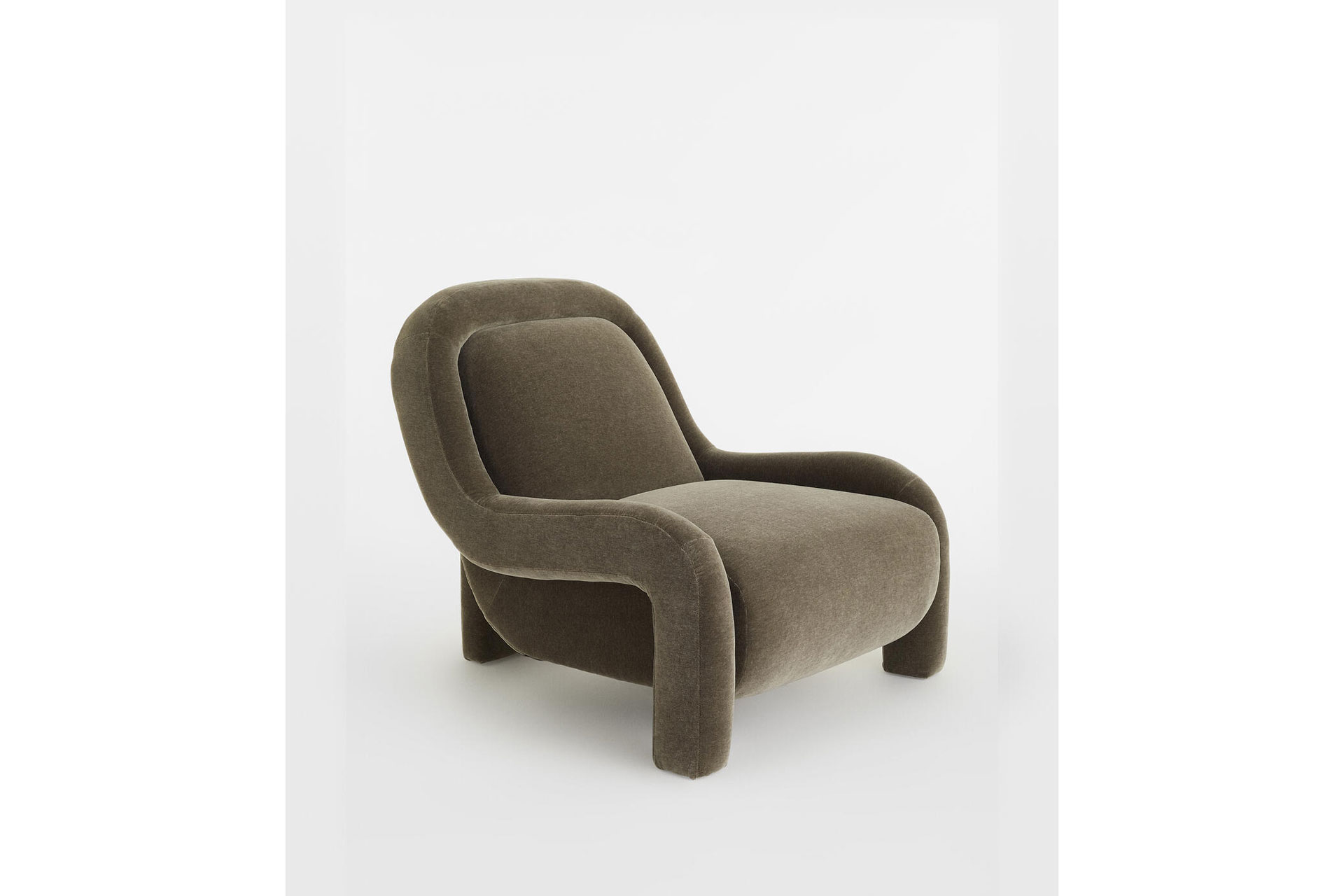 The Ellis Chair, by Soho Home, which is soft, squishy, velvety, that comes in grey
