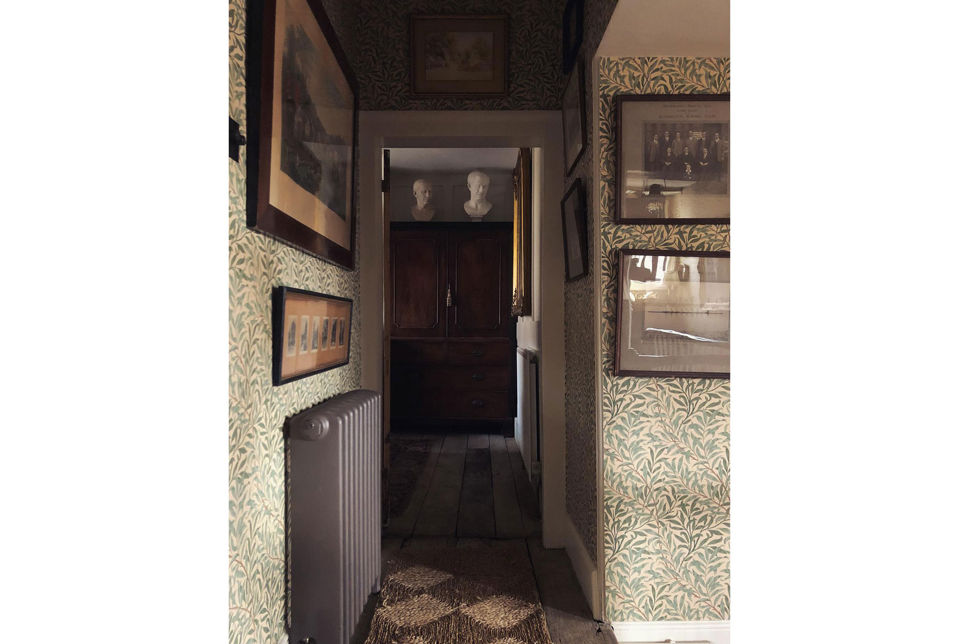 an interior of a cottage with Morris & Co Willow Bough Wallpaper, in the home of Jack Laver Brister, @tradchap