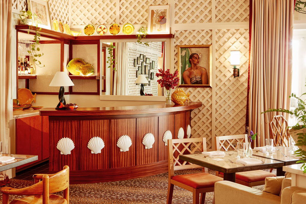 interior of bar with caribbean contemporary arty interior at Palm Heights hotel Cayman Islands 