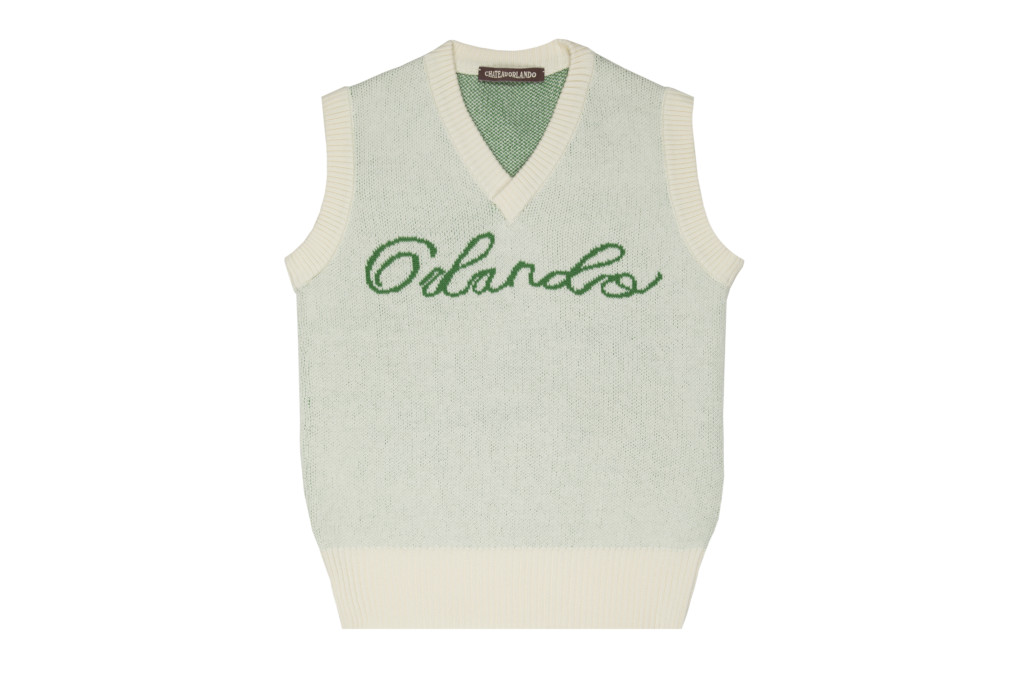Green sweater vest with the ord 'Orlando' on the front in cursive