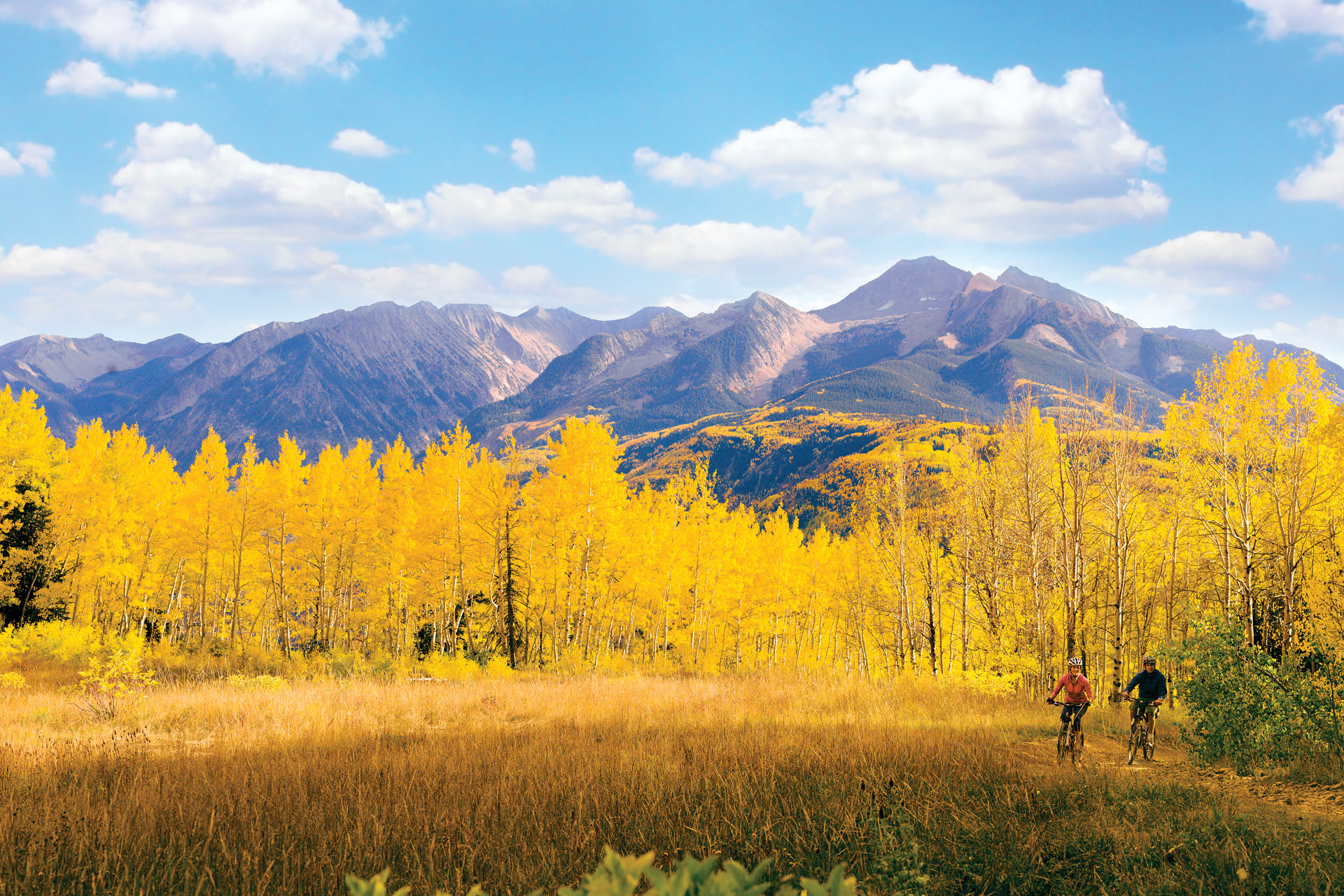 Mountain bikers, Chair Mountain from Huntsman Ridge, McClure Pass, Colorado