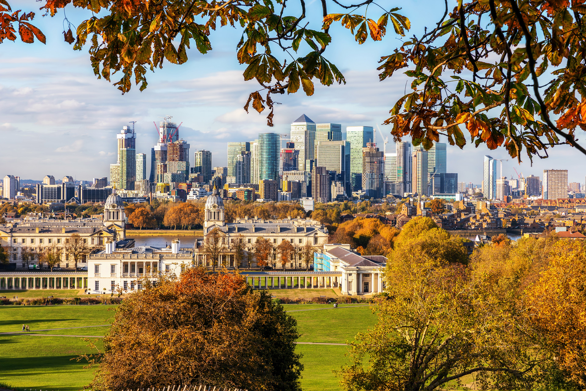 View to the skyline of the financial district Canary Wharf in London during autumn time, United Kingdom