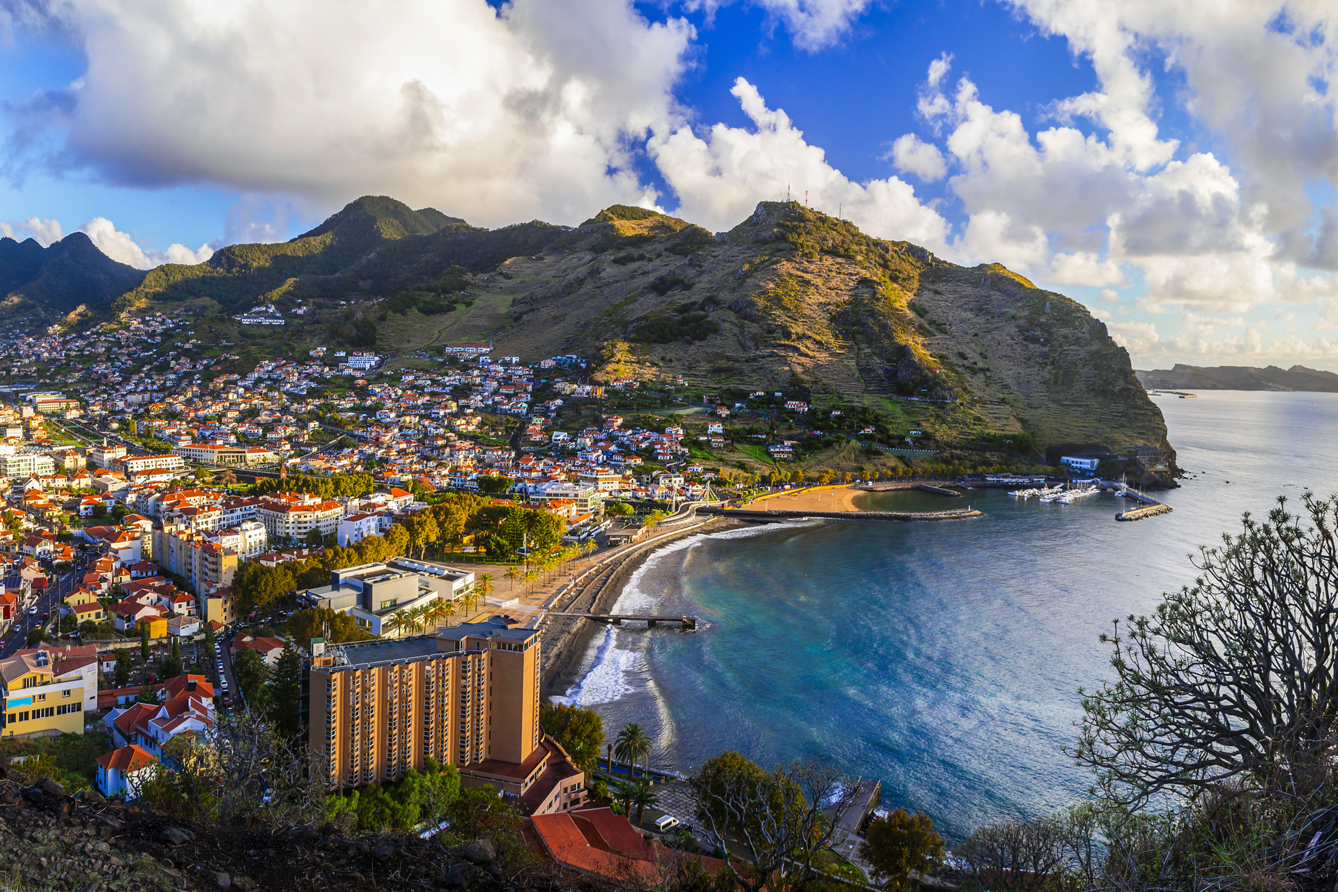 Breathtaking scenery of Madeira island, View of Machico town and beautiful bay with sandy beach. Eastern part of the island. Portugal travel