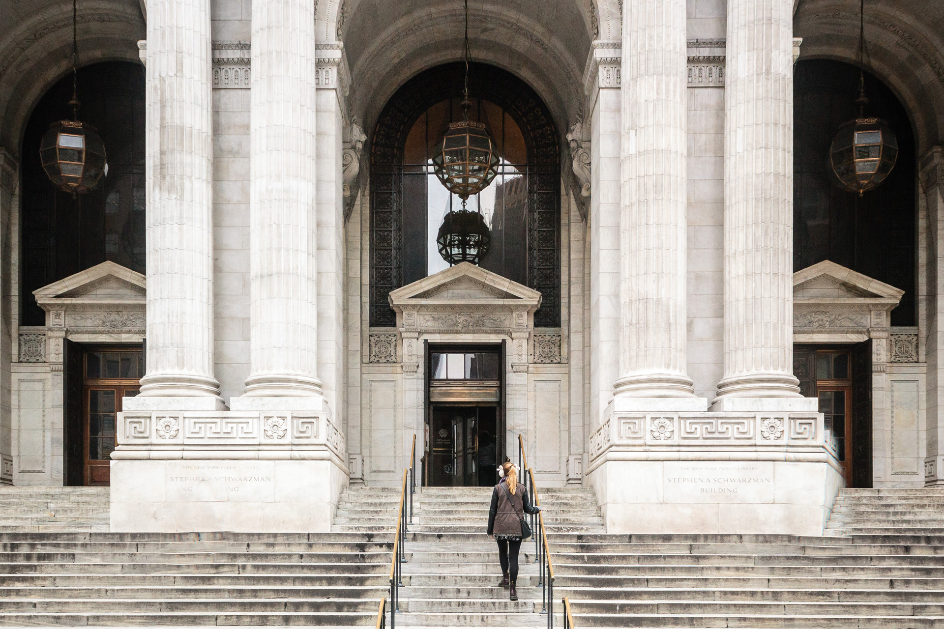 Photo of Girl in Front of New York City Public Library