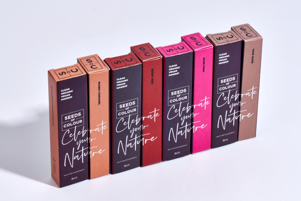 Boxes of colour balm lined up in a row