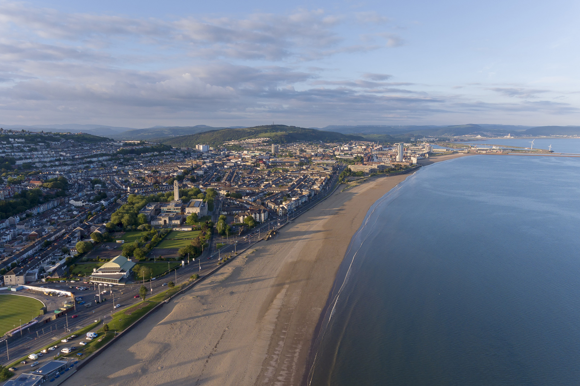 An aerial view of Swansea Bay, South Wales, UK, showing Victoria Park to the city centre