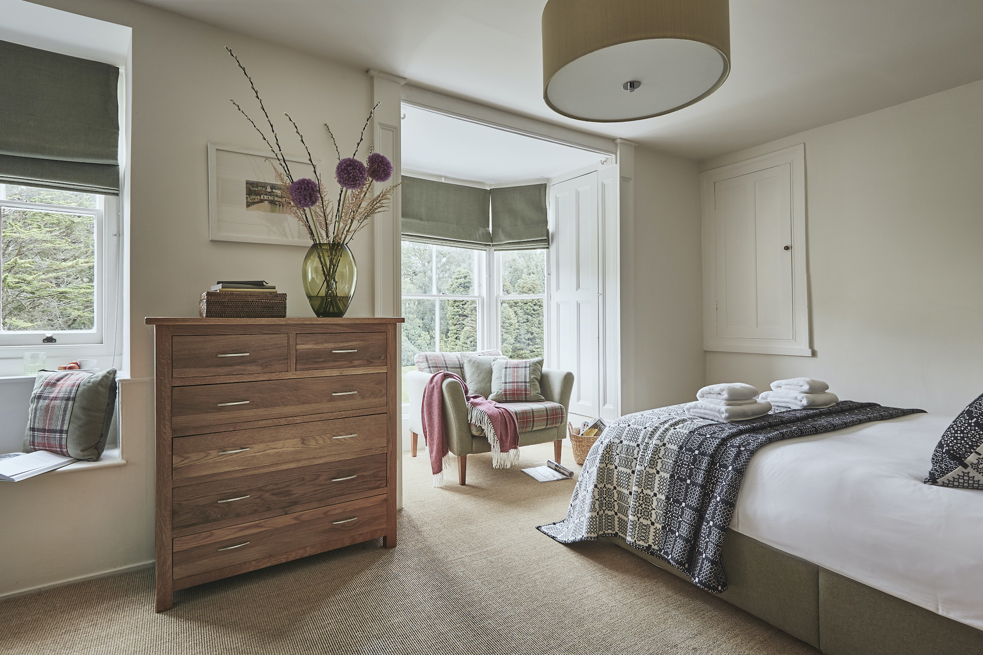 a spacious bedroom at tan llan