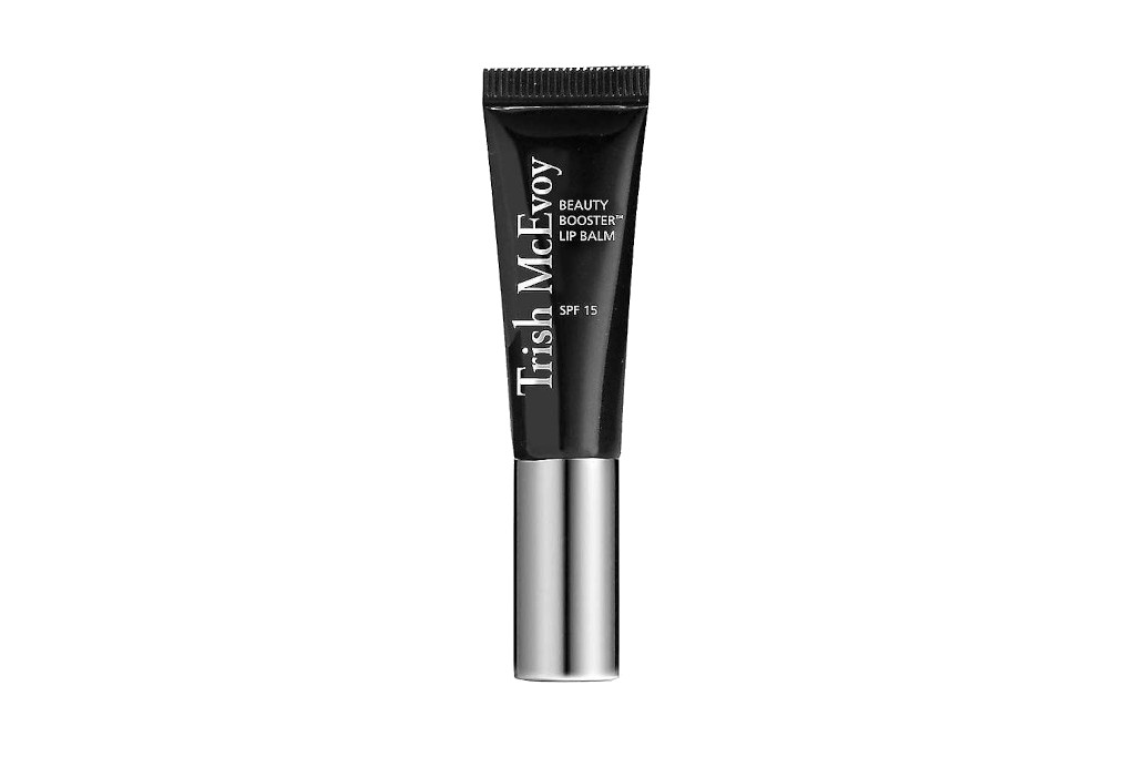 Black tube with silver lid, containing lip balm