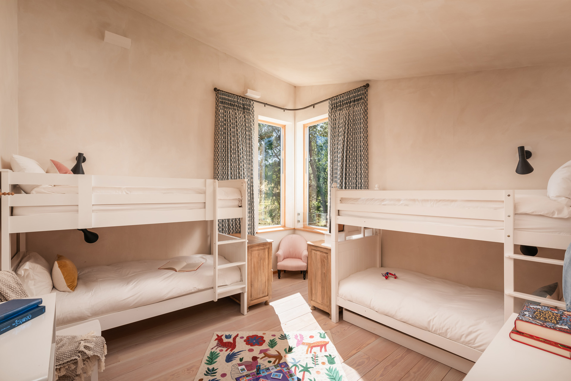 four bunkbeds in a bedroom