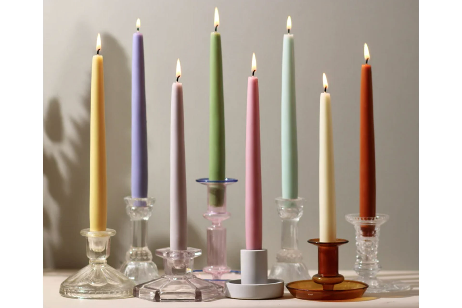 multicoloured dinner candles sold by an Etsy seller