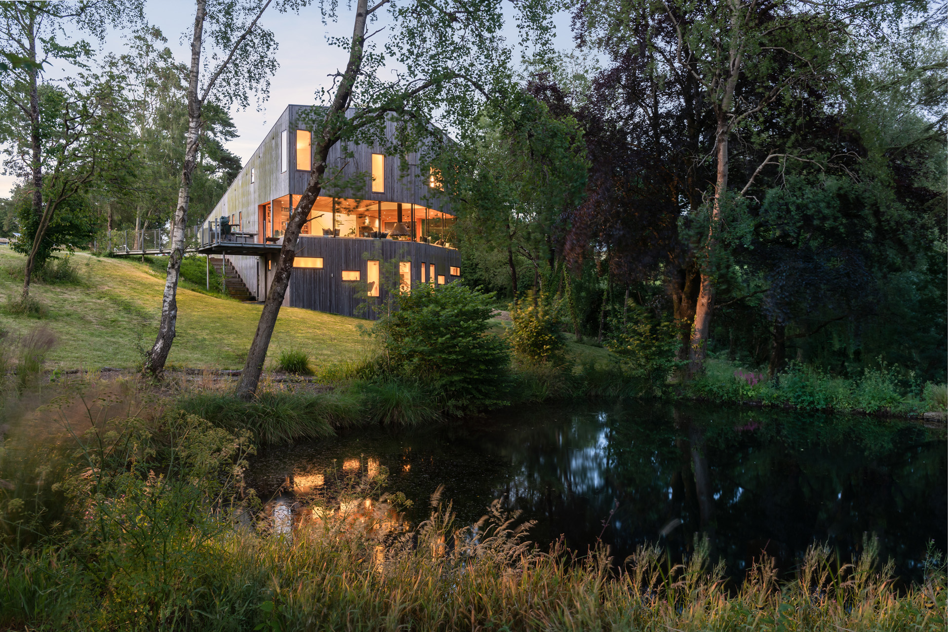 Look Inside: Light-Filled Grown-Up Treehouse Tucked Away in Devon