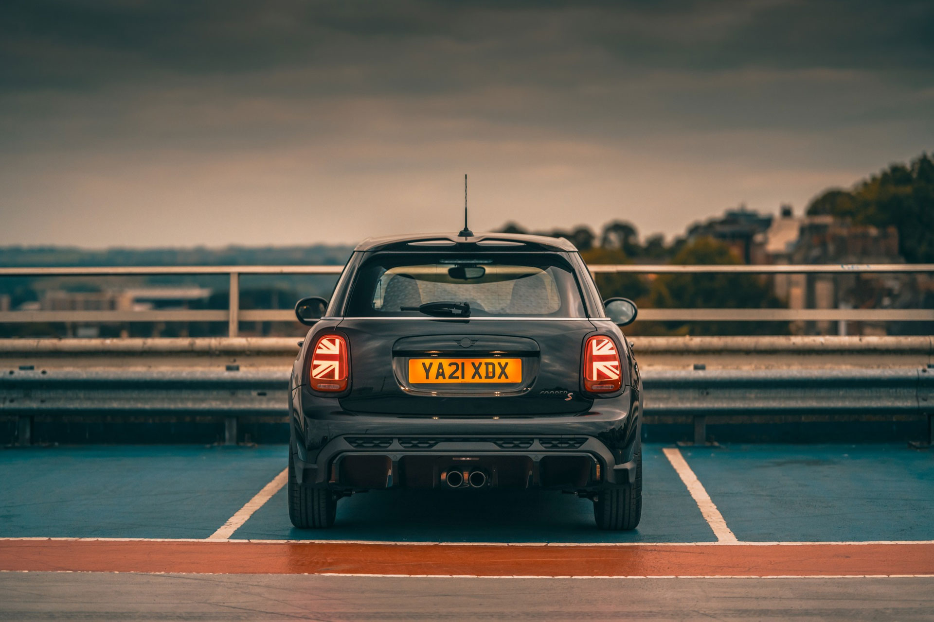 Rear view of the Mini Electric Shadow in a misty car park