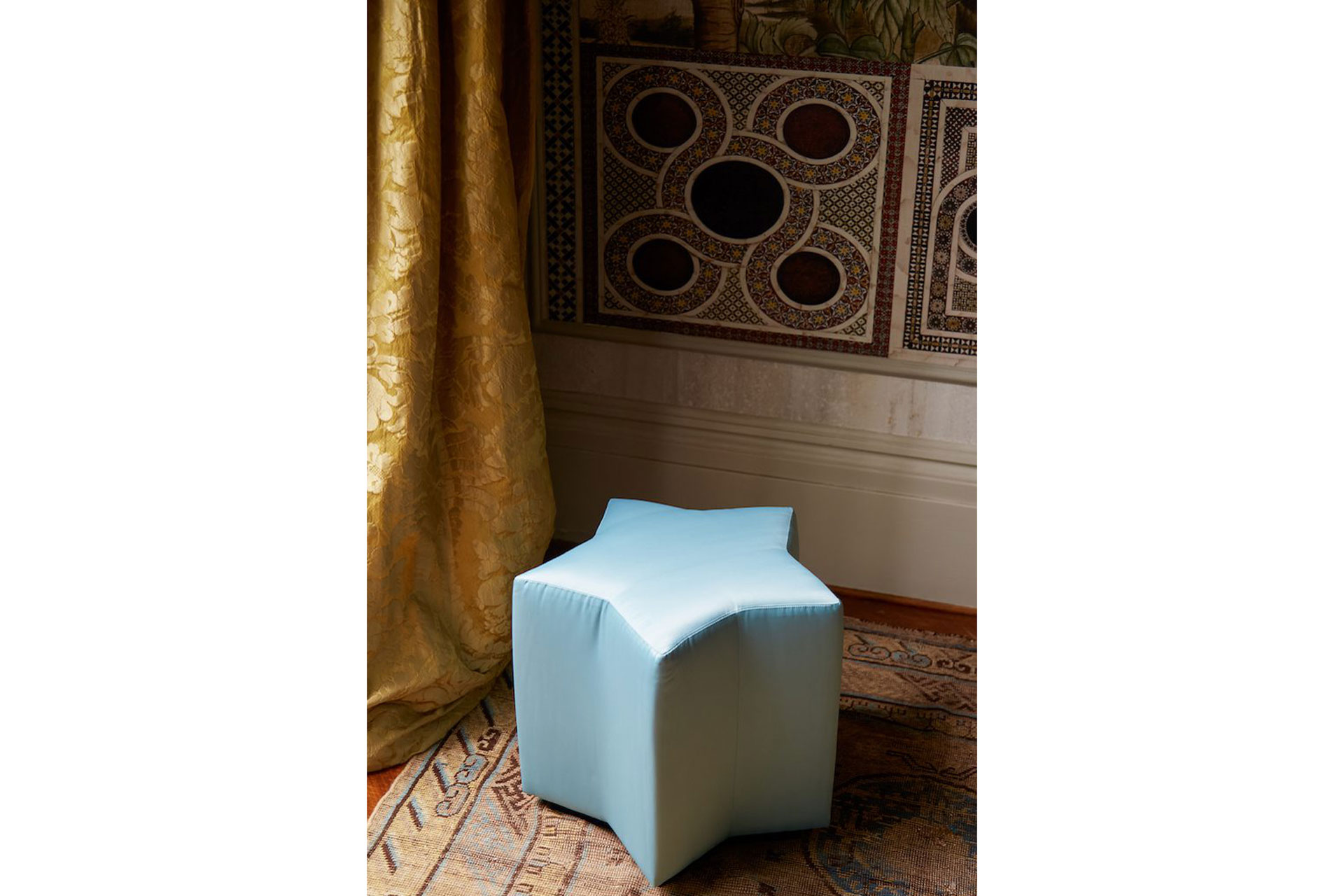 a light blue star chair by Campbell Rey, sold by The Invisible Collection